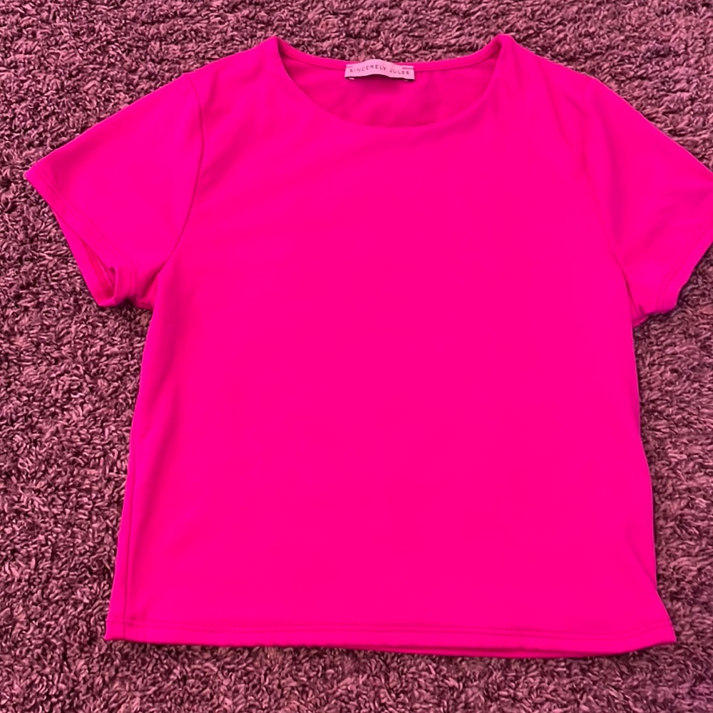 stretchy, bright pink, kinda cropped.